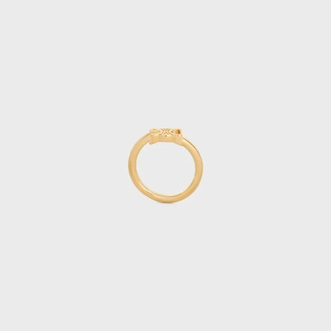 Anello asimmetrico Triomphe in ottone con finitura dorata