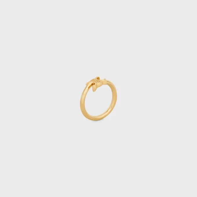 Anello asimmetrico Triomphe in ottone con finitura dorata