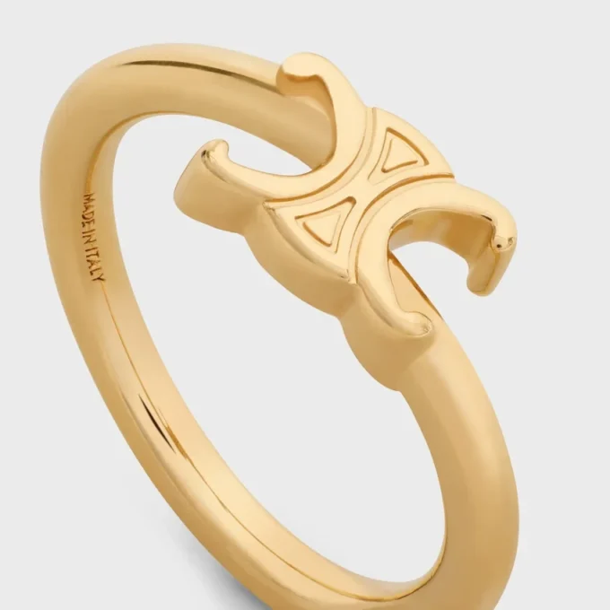 Anello asimmetrico Triomphe in ottone con finitura dorata