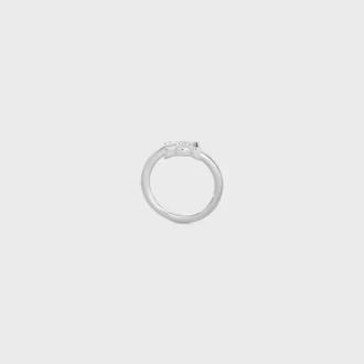 Anello asimmetrico Triomphe in ottone con finitura in rodio