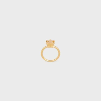 Anello Triomphe Solitaire Sparkle in strass e ottone con finitura dorata Anello Triomphe Solitaire Sparkle in strass e ottone con finitura dorata