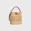 Borsa a secchiello Louise media in rafia e pelle di vitello Borsa a secchiello Louise media in rafia e pelle di vitello