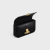 Borsa a tracolla con catena Claude in pelle di vitello lucida Borsa a tracolla con catena Claude in pelle di vitello lucida