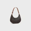 Borsa Ava in Triomphe Canvas e pelle di vitello Borsa Ava in Triomphe Canvas e pelle di vitello
