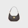 Borsa Ava Triomphe media in Triomphe Canvas e pelle di vitello Borsa Ava Triomphe media in Triomphe Canvas e pelle di vitello
