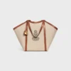 Borsa Cabas grande in tessuto con ricamo a forma di ancora e pelle di vitello Borsa Cabas grande in tessuto con ricamo a forma di ancora e pelle di vitello