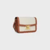 Borsa Classique Triomphe in tessuto con motivo Triomphe su tutta la superficie e pelle di vitello Borsa Classique Triomphe in tessuto con motivo Triomphe su tutta la superficie e pelle di vitello