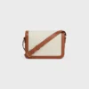 Borsa Classique Triomphe in tessuto con motivo Triomphe su tutta la superficie e pelle di vitello Borsa Classique Triomphe in tessuto con motivo Triomphe su tutta la superficie e pelle di vitello