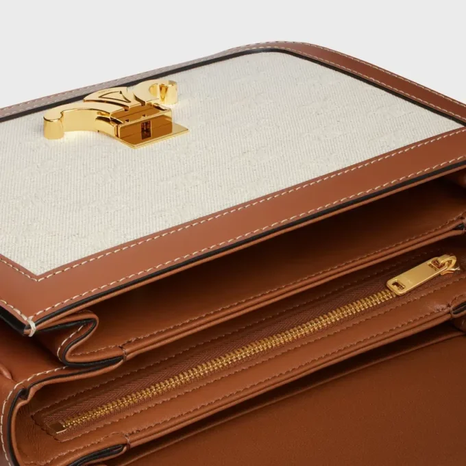 Borsa Classique Triomphe in tessuto con motivo Triomphe su tutta la superficie e pelle di vitello Borsa Classique Triomphe in tessuto con motivo Triomphe su tutta la superficie e pelle di vitello