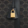 Borsa da viaggio in Triomphe Canvas e pelle di vitello