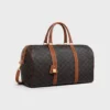 Borsa da viaggio media in Triomphe Canvas e pelle di vitello Borsa da viaggio media in Triomphe Canvas e pelle di vitello