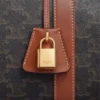 Borsa da viaggio media in Triomphe Canvas e pelle di vitello Borsa da viaggio media in Triomphe Canvas e pelle di vitello