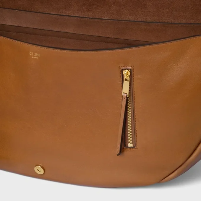 Borsa Halfmoon Soft Triomphe in morbida pelle di agnello lucida