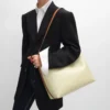 Borsa shopper morbida in Triomphe Canvas e pelle di vitello Borsa shopper morbida in Triomphe Canvas e pelle di vitello