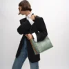 Borsa shopper morbida in Triomphe Canvas e pelle di vitello Borsa shopper morbida in Triomphe Canvas e pelle di vitello