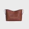 Borsa shopper morbida in Triomphe Canvas e pelle di vitello
