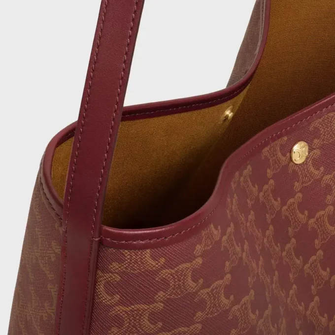 Borsa shopper morbida in Triomphe Canvas e pelle di vitello