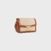 Borsa Teen Triomphe in tessuto e pelle di vitello Borsa Teen Triomphe in tessuto e pelle di vitello