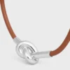 Bracciale a nodo in pelle di vitello e ottone con finitura in rodio Bracciale a nodo in pelle di vitello e ottone con finitura in rodio