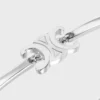 Bracciale articolato Triomphe in ottone con finitura in rodio Bracciale articolato Triomphe in ottone con finitura in rodio