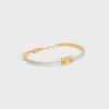 Bracciale articolato Triomphe in smalto e ottone con finitura dorata Bracciale articolato Triomphe in smalto e ottone con finitura dorata