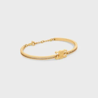 Bracciale articolato Triomphe Sparkle in strass e ottone con finitura dorata