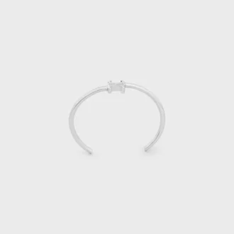 Bracciale asimmetrico Triomphe in ottone con finitura in rodio