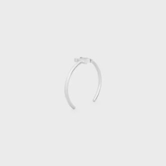 Bracciale asimmetrico Triomphe in ottone con finitura in rodio