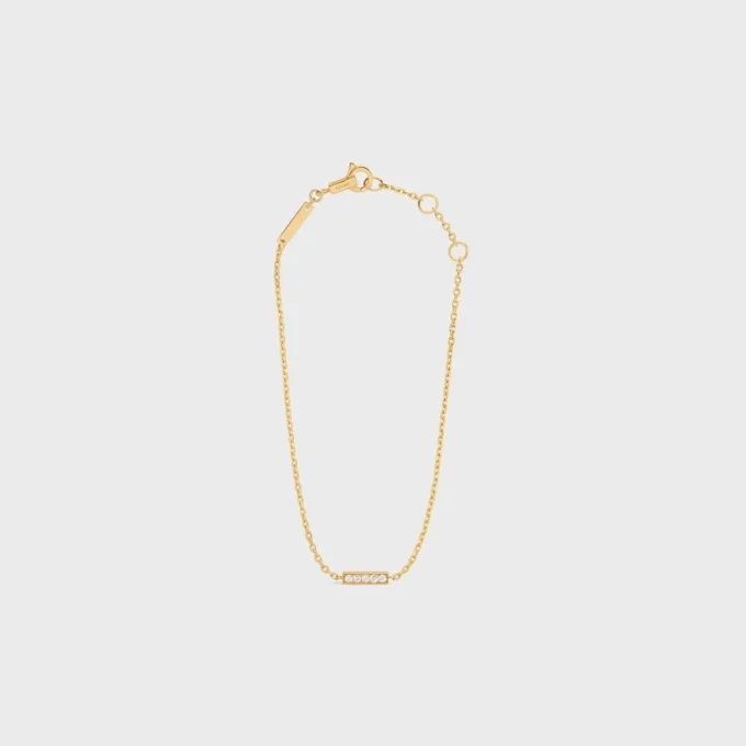 Bracciale della linea CELINE in oro giallo e diamanti Bracciale della linea CELINE in oro giallo e diamanti