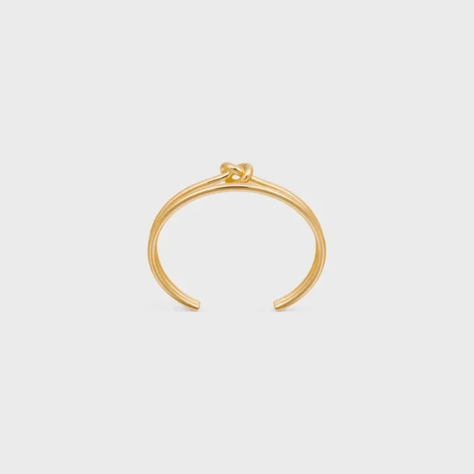Bracciale doppio a nodo in ottone con finitura dorata