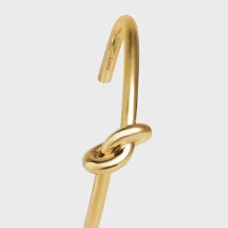 Bracciale Knot extra-sottile in ottone con finitura dorata