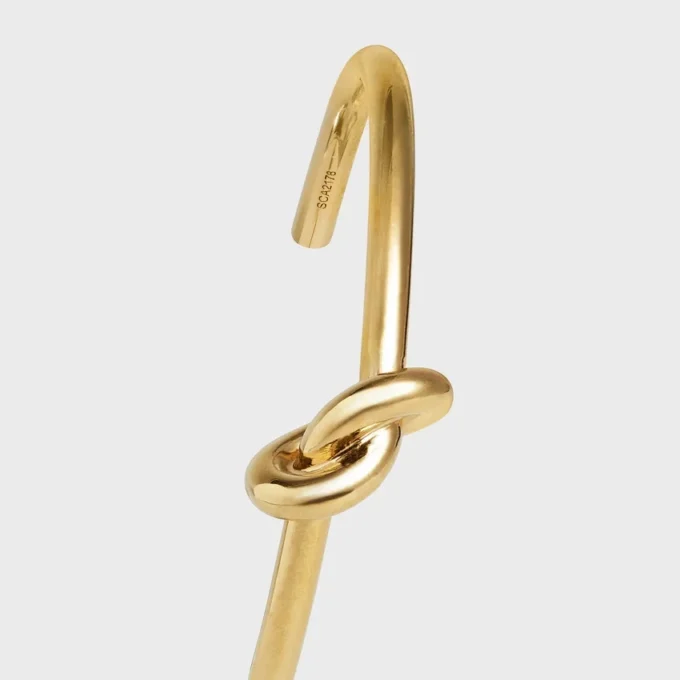 Bracciale Knot extra-sottile in ottone con finitura dorata Bracciale Knot extra-sottile in ottone con finitura dorata