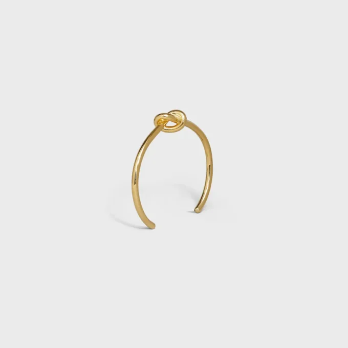 Bracciale Knot extra-sottile in ottone con finitura dorata Bracciale Knot extra-sottile in ottone con finitura dorata