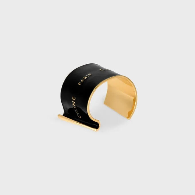 Bracciale rigido CELINE Ribbon Large in smalto e ottone con finitura dorata Bracciale rigido CELINE Ribbon Large in smalto e ottone con finitura dorata