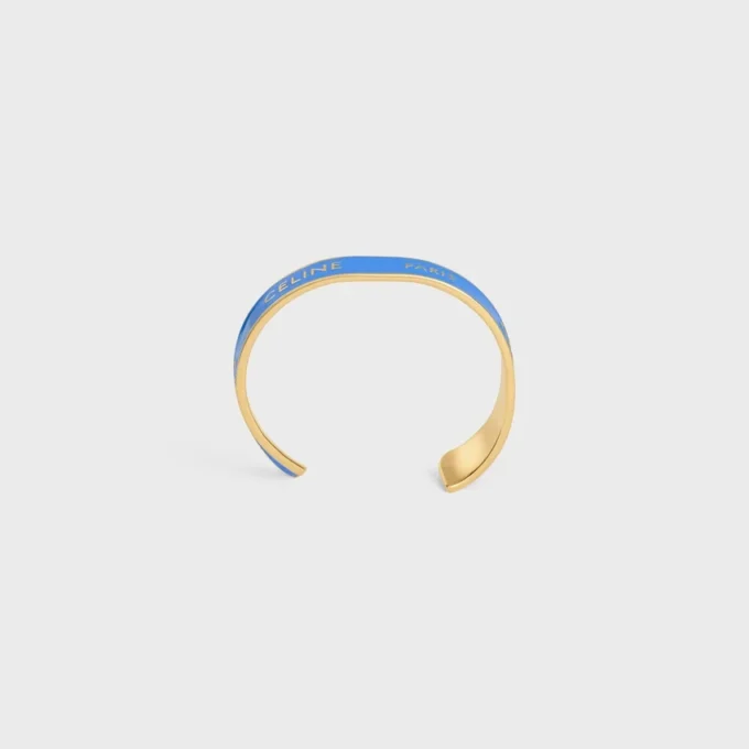 Bracciale rigido CELINE Ribbon Small in smalto e ottone con finitura dorata Bracciale rigido CELINE Ribbon Small in smalto e ottone con finitura dorata