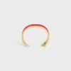 Bracciale rigido CELINE Ribbon Small in smalto e ottone con finitura dorata Bracciale rigido CELINE Ribbon Small in smalto e ottone con finitura dorata
