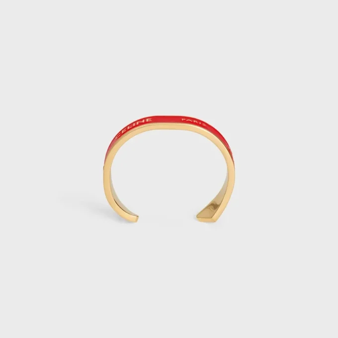 Bracciale rigido CELINE Ribbon Small in smalto e ottone con finitura dorata Bracciale rigido CELINE Ribbon Small in smalto e ottone con finitura dorata