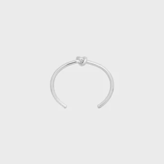 Bracciale rigido Knot in ottone con finitura in rodio