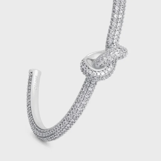 Bracciale rigido Knot Sparkle in strass e ottone con finitura in rodio Bracciale rigido Knot Sparkle in strass e ottone con finitura in rodio