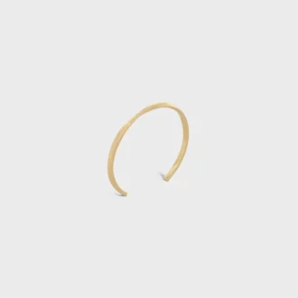 Bracciale Torsion in oro giallo