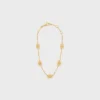 Bracciale Triomphe Mini Triomphe in ottone con finitura dorata Bracciale Triomphe Mini Triomphe in ottone con finitura dorata