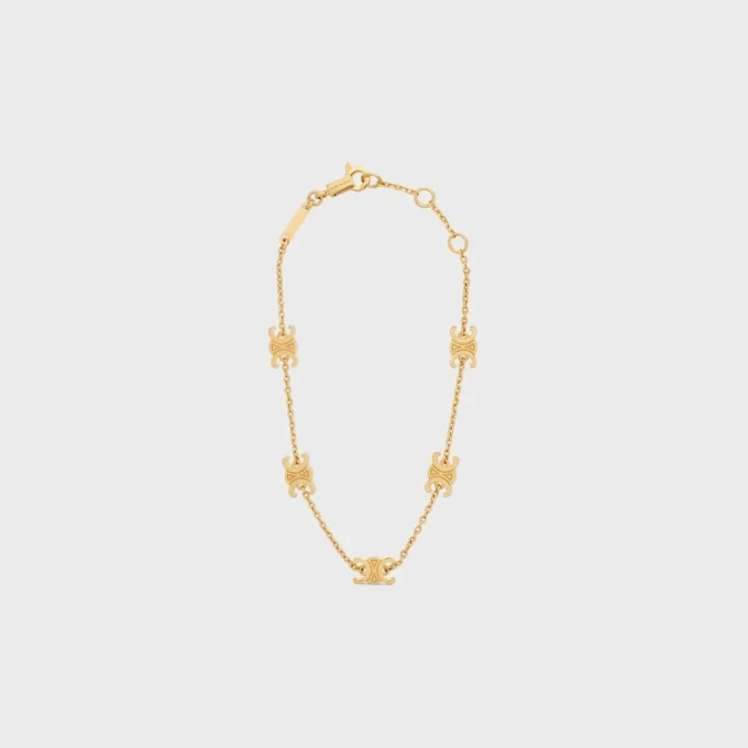 Bracciale Triomphe Mini Triomphe in ottone con finitura dorata Bracciale Triomphe Mini Triomphe in ottone con finitura dorata