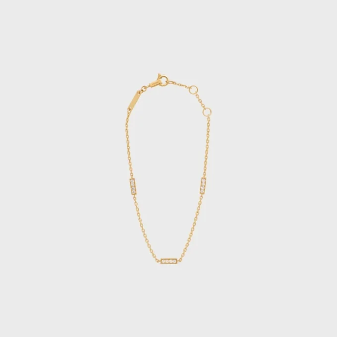 CELINE Bracciale triplo in oro giallo e diamanti