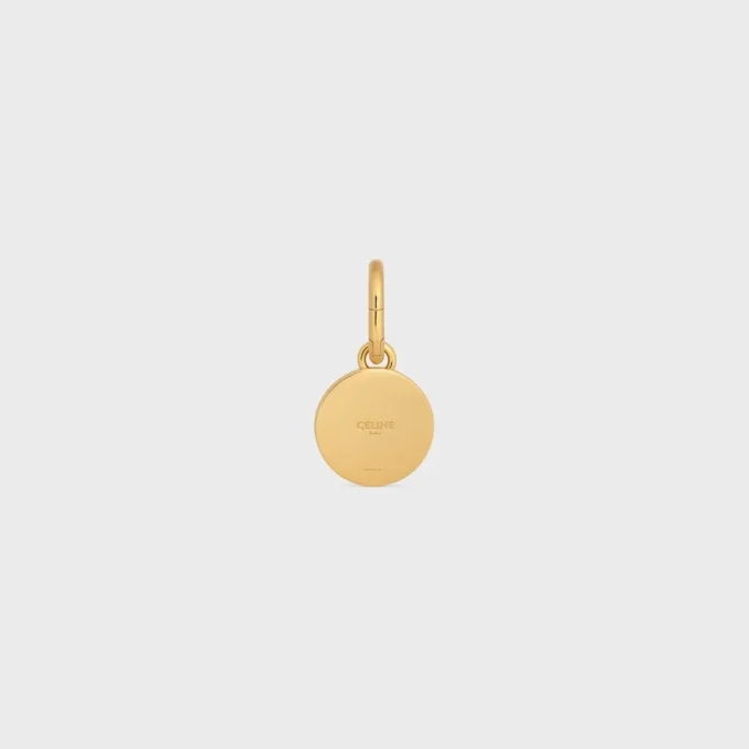 Ciondoli Medaglia a forma di perla in resina e ottone con finitura dorata Ciondoli Medaglia a forma di perla in resina e ottone con finitura dorata
