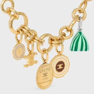 Ciondoli Medaglia a forma di perla in resina e ottone con finitura dorata Ciondoli Medaglia a forma di perla in resina e ottone con finitura dorata