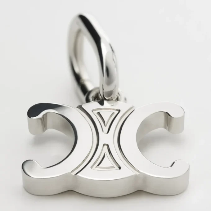 Ciondoli Triomphe in ottone con finitura in rodio Ciondoli Triomphe in ottone con finitura in rodio