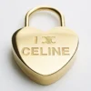 Ciondolo a forma di cuore con lucchetto in ottone con finitura dorata Ciondolo a forma di cuore con lucchetto in ottone con finitura dorata