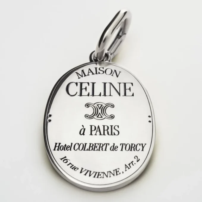 Ciondolo CELINE in ottone con finitura in rodio