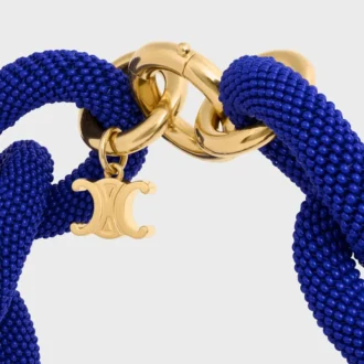 Collana Ata CELINE Links in perline e ottone con finitura dorata
