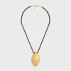 Collana CELINE Dafila Shell in ottone con finitura dorata e seta